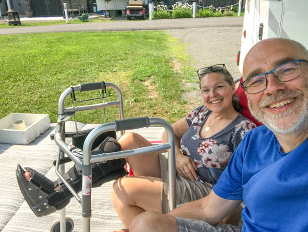 istock Smiling couple besides their motorhome 1583173664