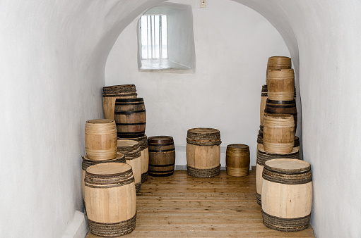 Ancient powder kegs in white room
