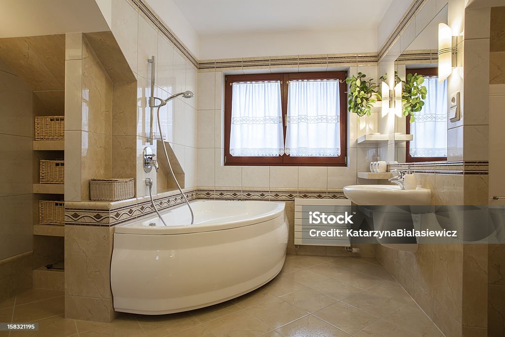 Bathroom Contemporary bathroom interior, big bath and window Architecture Stock Photo