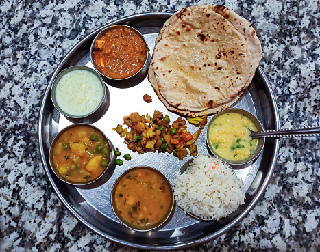 Indian veg thali with selective focus image.