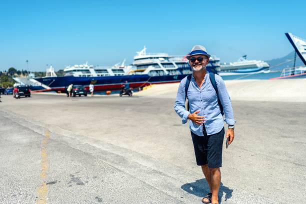 Mature man disembarking from a Greek ferry