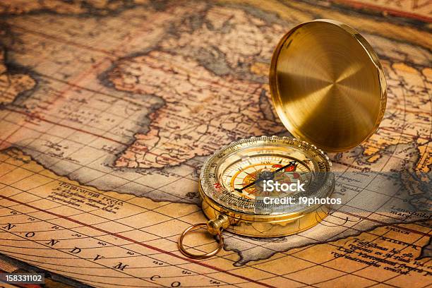 Old Vintage Golden Compass On Ancient Map Stock Photo - Download Image Now - Direction, Horizontal, Navigational Compass