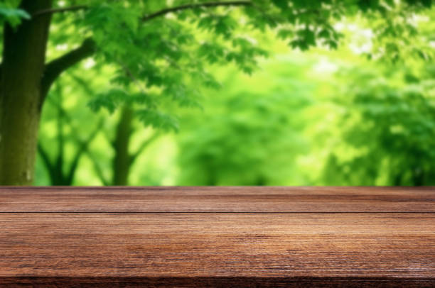 istock Background of a beautiful and bright natural with desk 1583354448