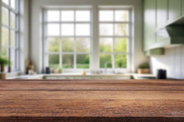 istock Background of a beautiful and bright kitchen with desk 1583359306