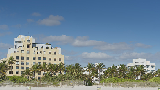 Arte deco building next to the sand in Miami Beach, Florida on a sunny day in spring.