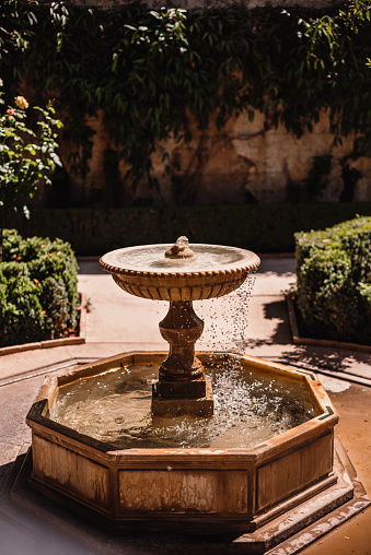 Granada,Spain - July 4, 2023: close-up of fountains in the gardens of the alhambra in granada, Spain.