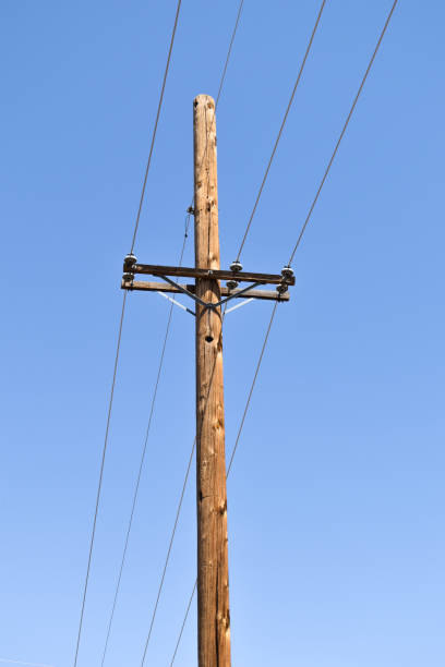 istock Lone Wooden Power Pole 1583383880