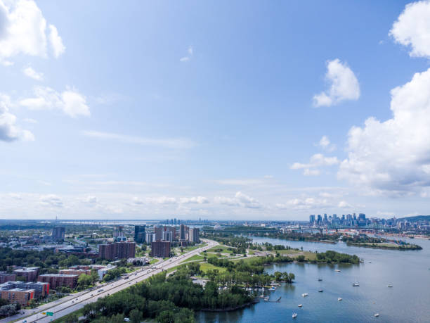 Aerial view of Montreal skyline and St. Lawrence river from South Shore during summer day
