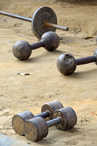 istock barbells and dumbbells 158344479