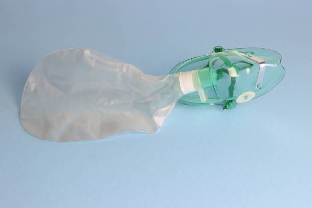 Adult Oxygen mask in a light blue background