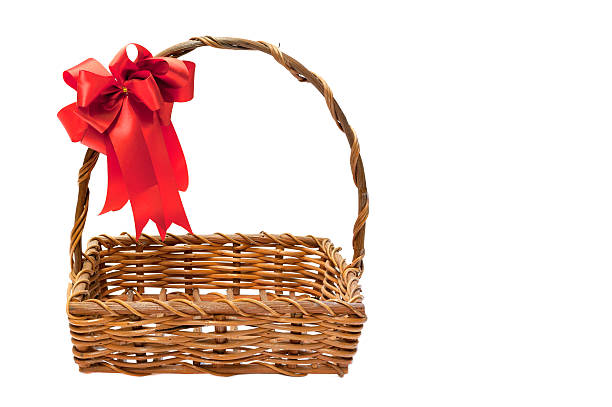 Bamboo basket Bamboo basket isolated on white background Decorated with red ribbons on top basket weaving stock pictures, royalty-free photos & images