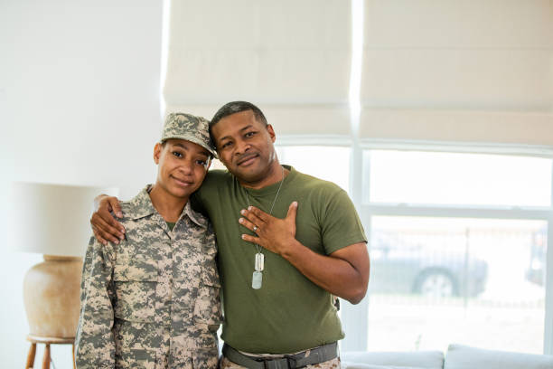 istock Before leaving on deployment soldier daughter and pose for photo 1583459369