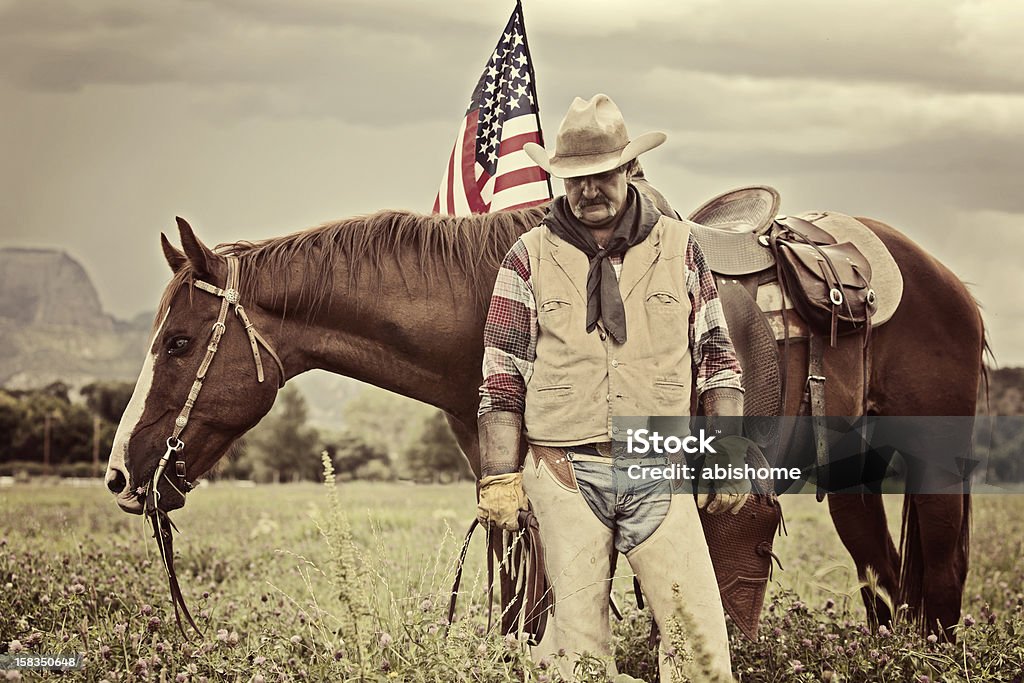 all done hardworking cowboy trying to preserve his way of life Horse Stock Photo