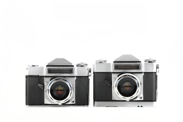 istock Very rare old 35 mm SLR cameras on white background. 1583514692