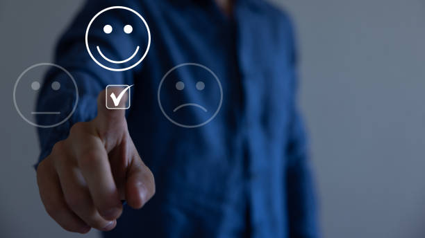istock Customer service and Satisfaction concept, Businessman pressing smiley face emoticon on virtual touch screen. On the happy Smiley face icon to give satisfaction in service. Rating very impressed. 1583537318