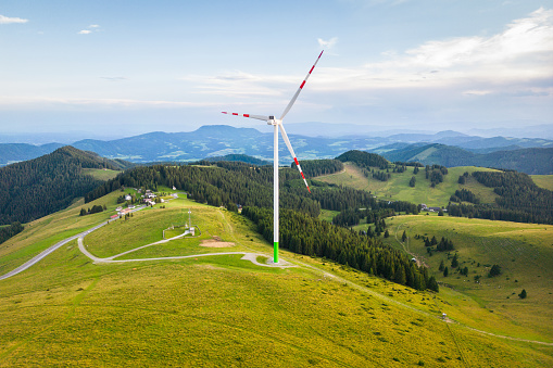 Wind generators on a mountain pasture at the Sommeralm in Styria, Austria