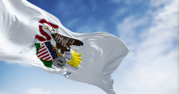 istock Illinois state flag waving in the wind on a clear day 1583547913