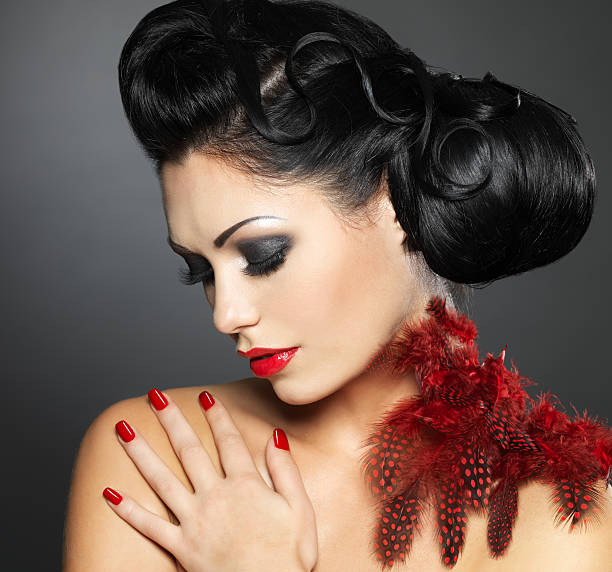 istock Woman with red nails and creative hairstyle 158354872