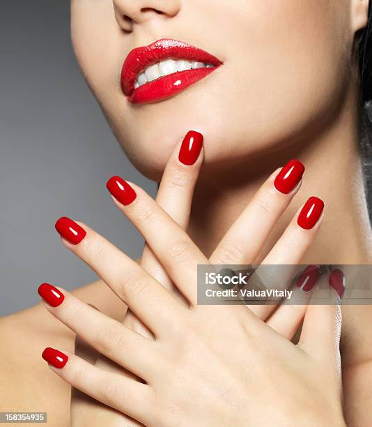 Woman With Fashion Red Nails And Sensual Lips Stock Photo - Download Image Now - Manicure, Red, Adult