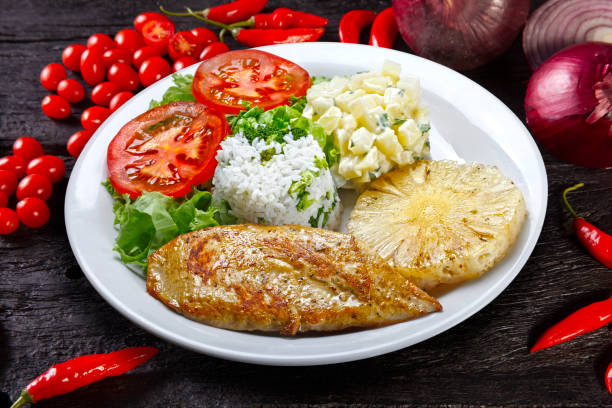 istock Grilled pork with fries and vegetables 1583566449