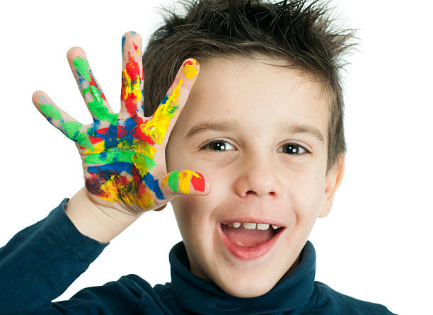 istock Boy hands painted with colorful paint 158356769