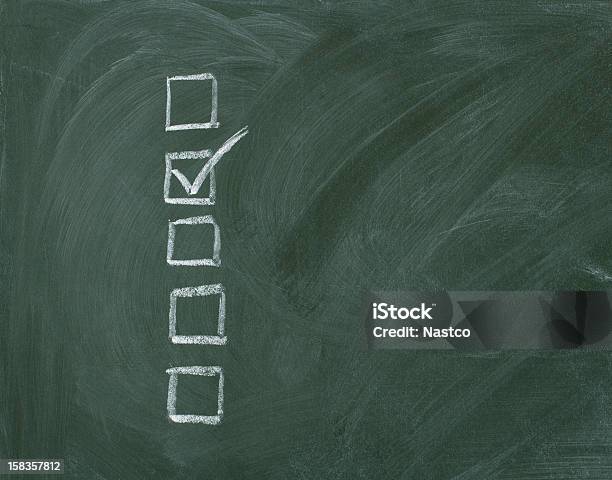 Checklist At The Chalkboard Stock Photo - Download Image Now - Chalkboard - Visual Aid, Checkbox, Announcement Message