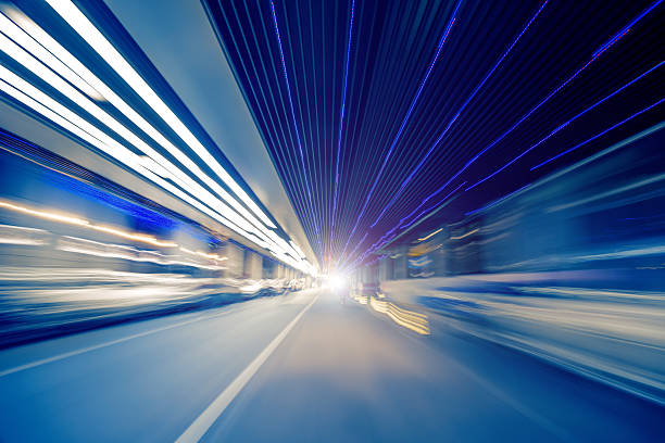 Fast car moving in motion through an underground tunnel