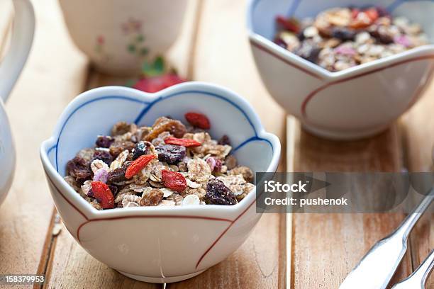 Muesli With Dried Fruits Stock Photo - Download Image Now - Almond, Blueberry, Bowl