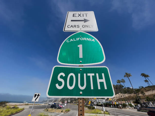 Highway sign with Dollar Sign on Arrow Road - Sky Background - 3D rendering