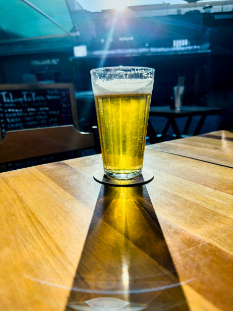 istock A cold beer glass is on the table. 1583905598