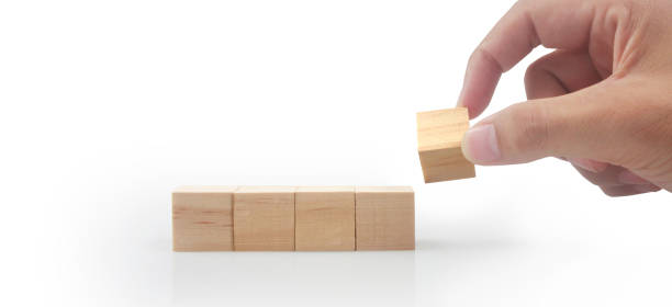 istock Wooden cubes in hand with copy space for input wording 1583923255