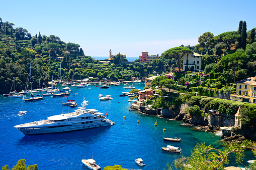 Portofino, Italy. Beautiful bay with boats in the Mediterranean Sea.