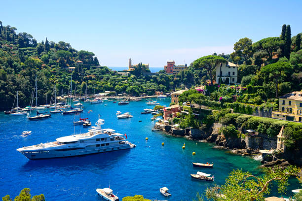 Portofino, Italy. Beautiful bay with boats in the Mediterranean Sea. stock photo