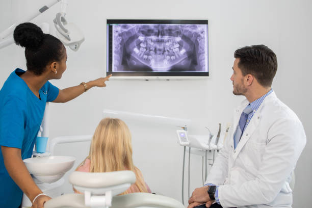 istock Little girl visiting a dentist 1583954963