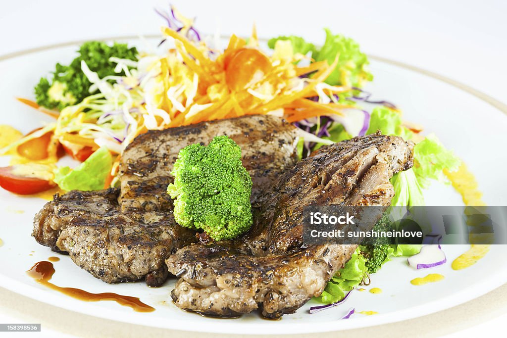 De carne de porco com produtos hortícolas e Molho de Carne - Royalty-free Bife Foto de stock