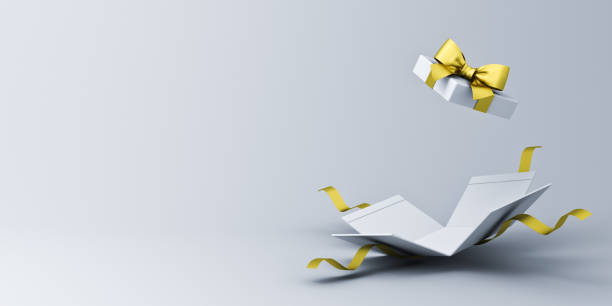 istock Open white present box or blank gift box with gold ribbons and bow isolated on white grey background with shadow and empty space minimal conceptual 3D rendering 1583988433