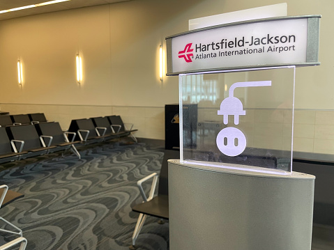 Atlanta, GA - February 9th, 2023: A publicly accessible charging point, in Terminal F at Atlanta's Hatfield Jackson International Airport.