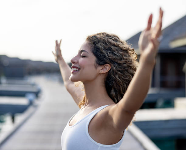 Beautiful woman outdoors enjoying her freedom