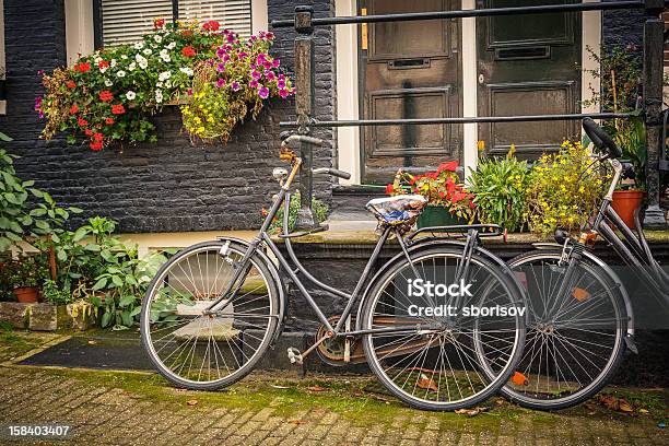 Bicycles In Amsterdam Stock Photo - Download Image Now - Amsterdam, Bicycle, Built Structure