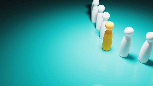 istock White plastic figures gathered together and led by a yellow figure, community theme, 3d illustration 1584042191