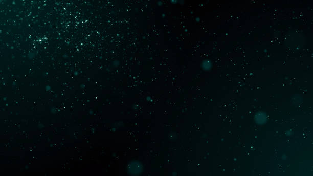 istock Particles dust abstract light bokeh motion titles cinematic background 1584138988