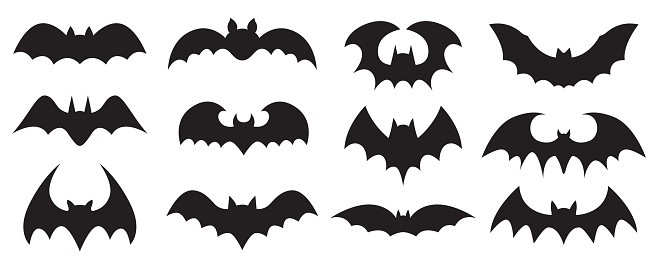 Vector illustration of twelve vampire bat silhouettes on a white background.