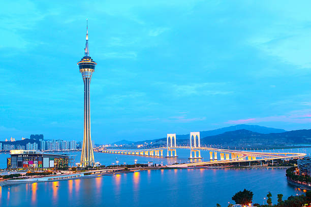 istock famous travel tower near river in Macao, 158419248