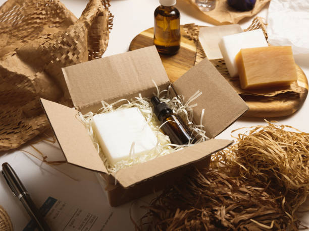 istock Beauty box with serum bottles on shredded white paper 1584201436