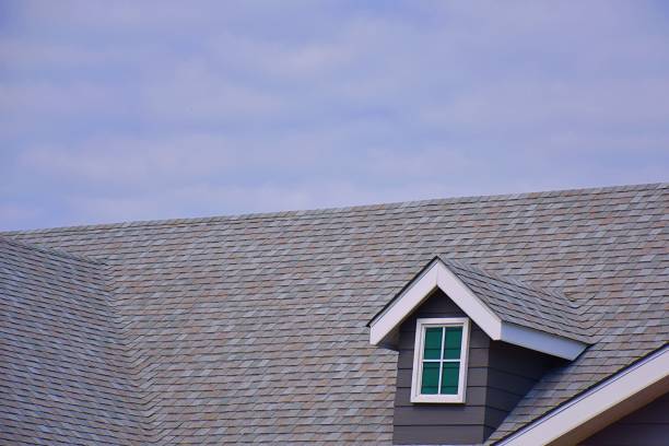 istock House roof style, sky with clouds background 1584218178