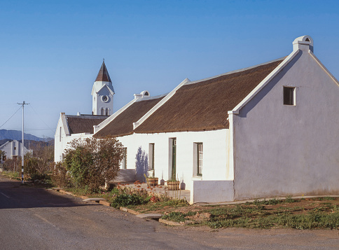 McGregor, South Africa - July 29, 2023: Cape Dutch cottages in McGregor, a small village in the mountains of the Western Cape, South Africa.