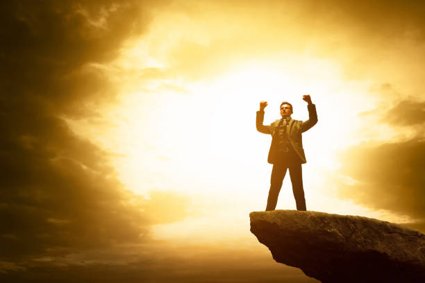 istock Business man looking on top mountain at sunset 3d illustration 1584278619