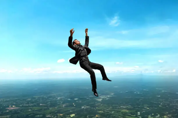 Photo of Falling business man 3d illustration