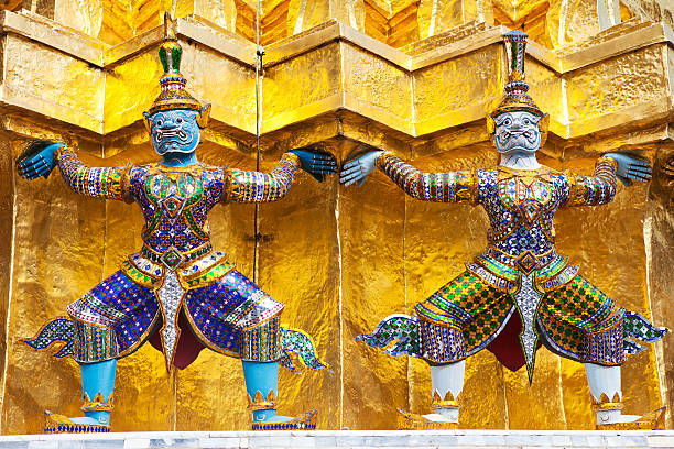 Gold Stupa With Demon Guardian Holding It Up