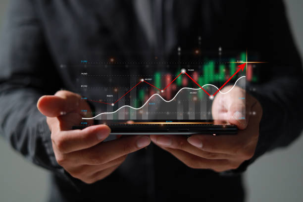 istock Analysis profitability positive indicators of working companies with digital augmented reality graphics. 1584313263